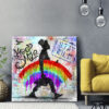 Tableau déco L'homme à l'arc en ciel street-art banksy